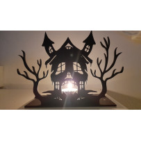 Rémségek háza mécses